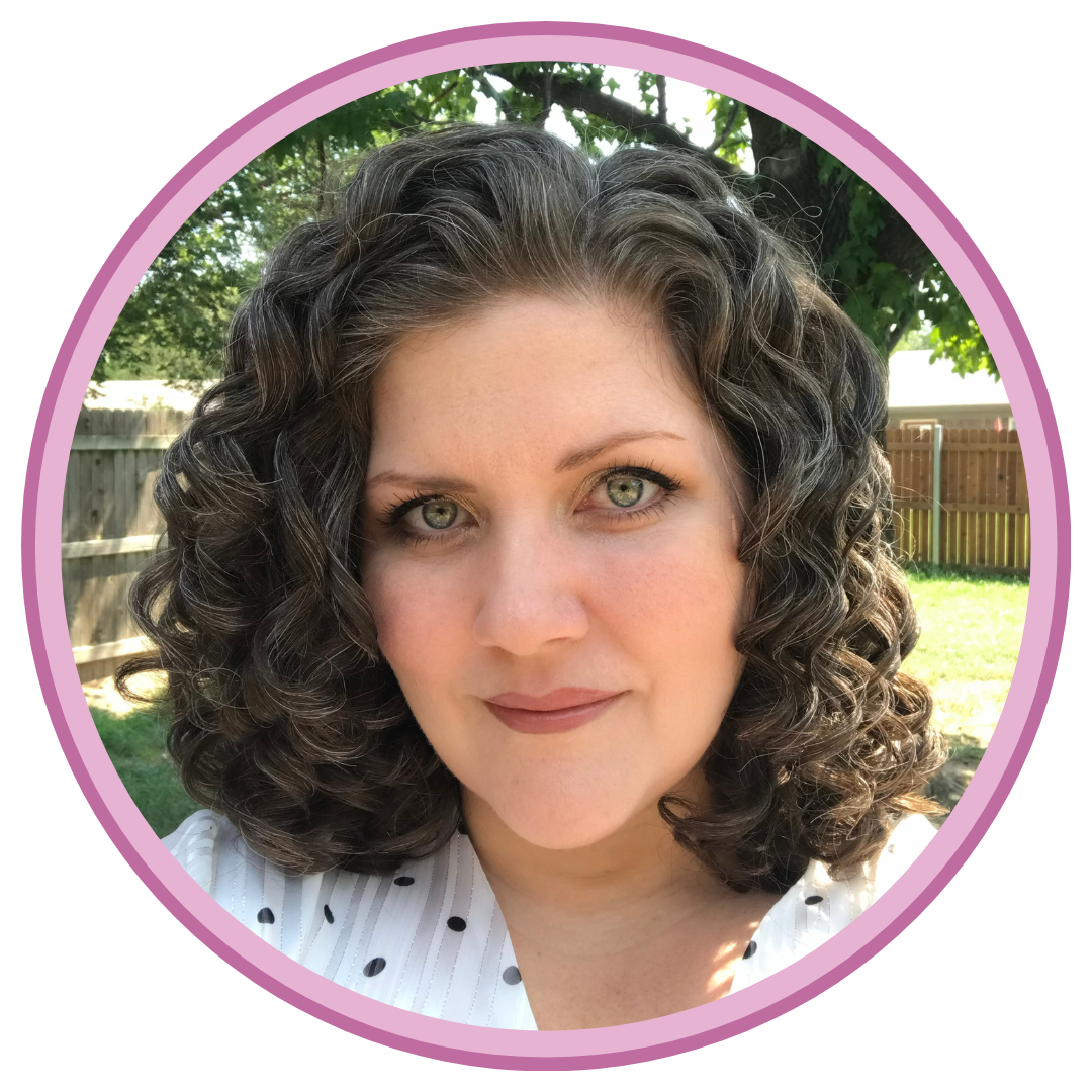 A friendly and smiling picture of curly-haired, green-eyed author, Kristen Iten