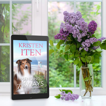 ebook cover for mending his ways next to a vase of flowers